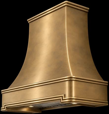 The Manhasset range hood in 25% antiqued cloudy brass, showing its bell-shaped body and stepped apron.